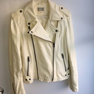 Converse cream colored leather jacket size large.